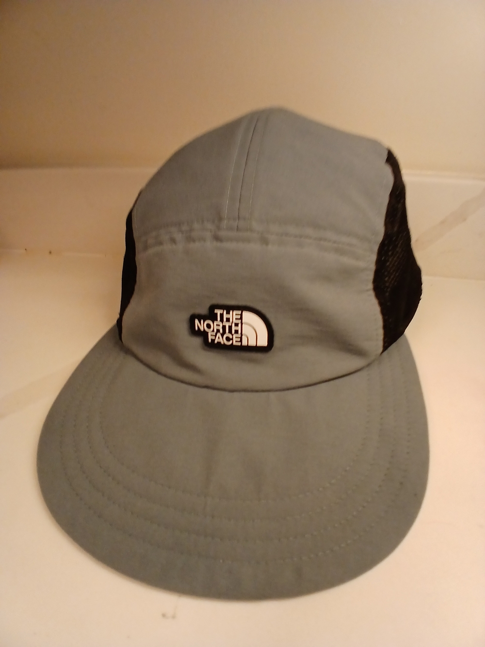 The North Face Pale Blue and Black Mesh Trail 5 Panel Camp Hat Adjustable